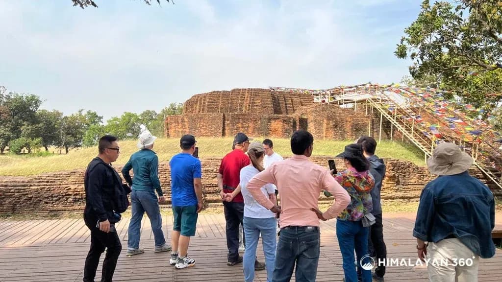 Travellers clicking pictures in Kudan, Lumbini