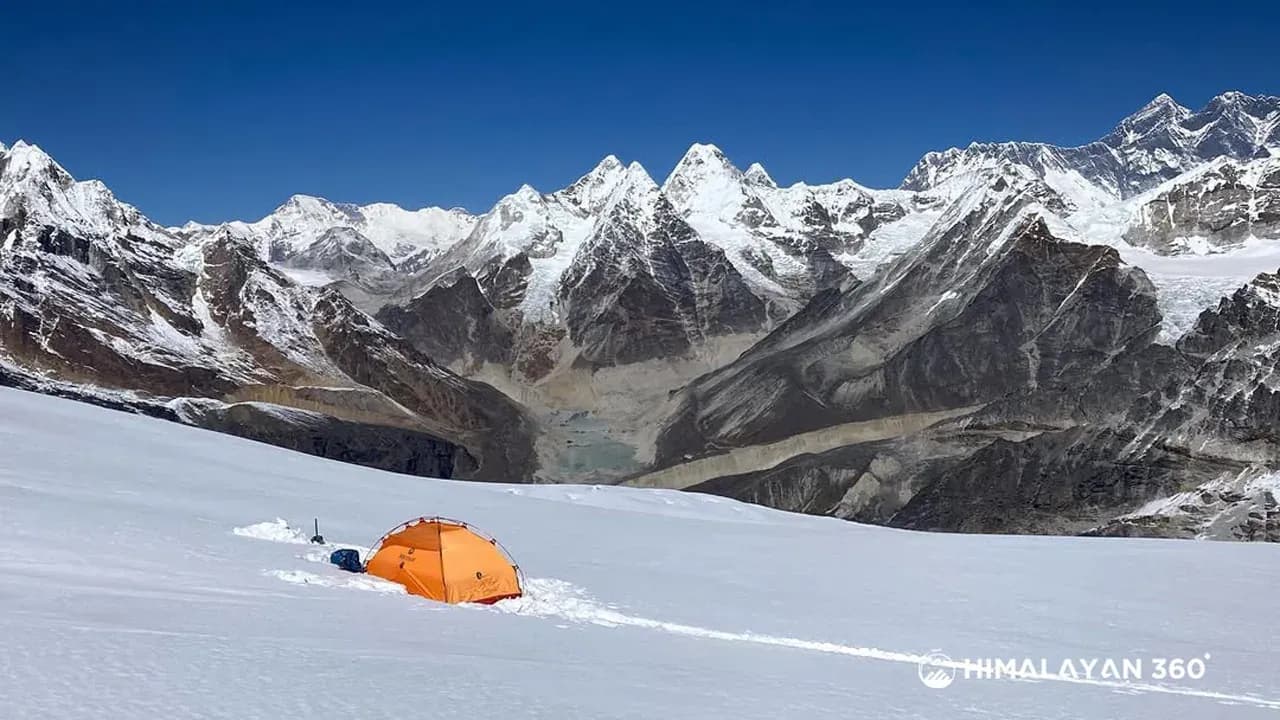 Snow capped Mountain and a Tent in Mera Peak