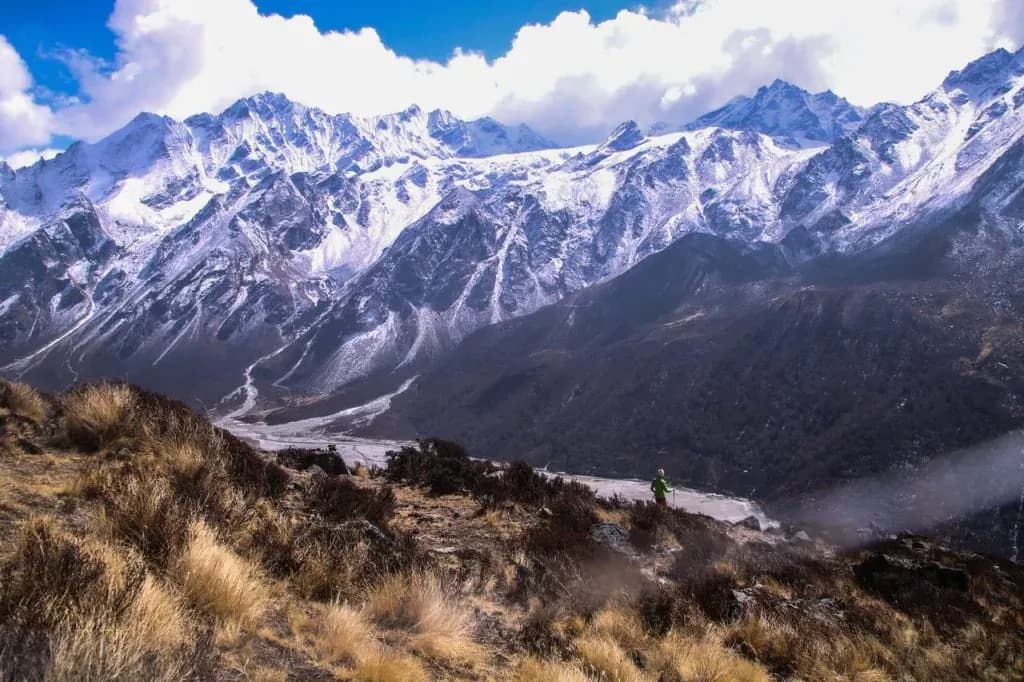 trekker walking in langtang valley