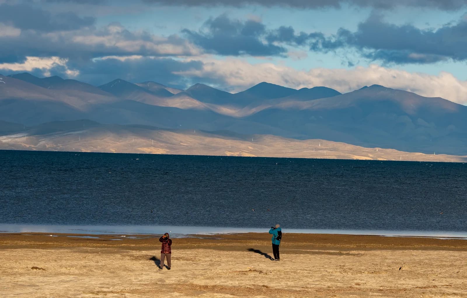 Pilgrims on the shore of Lake Mansarovar