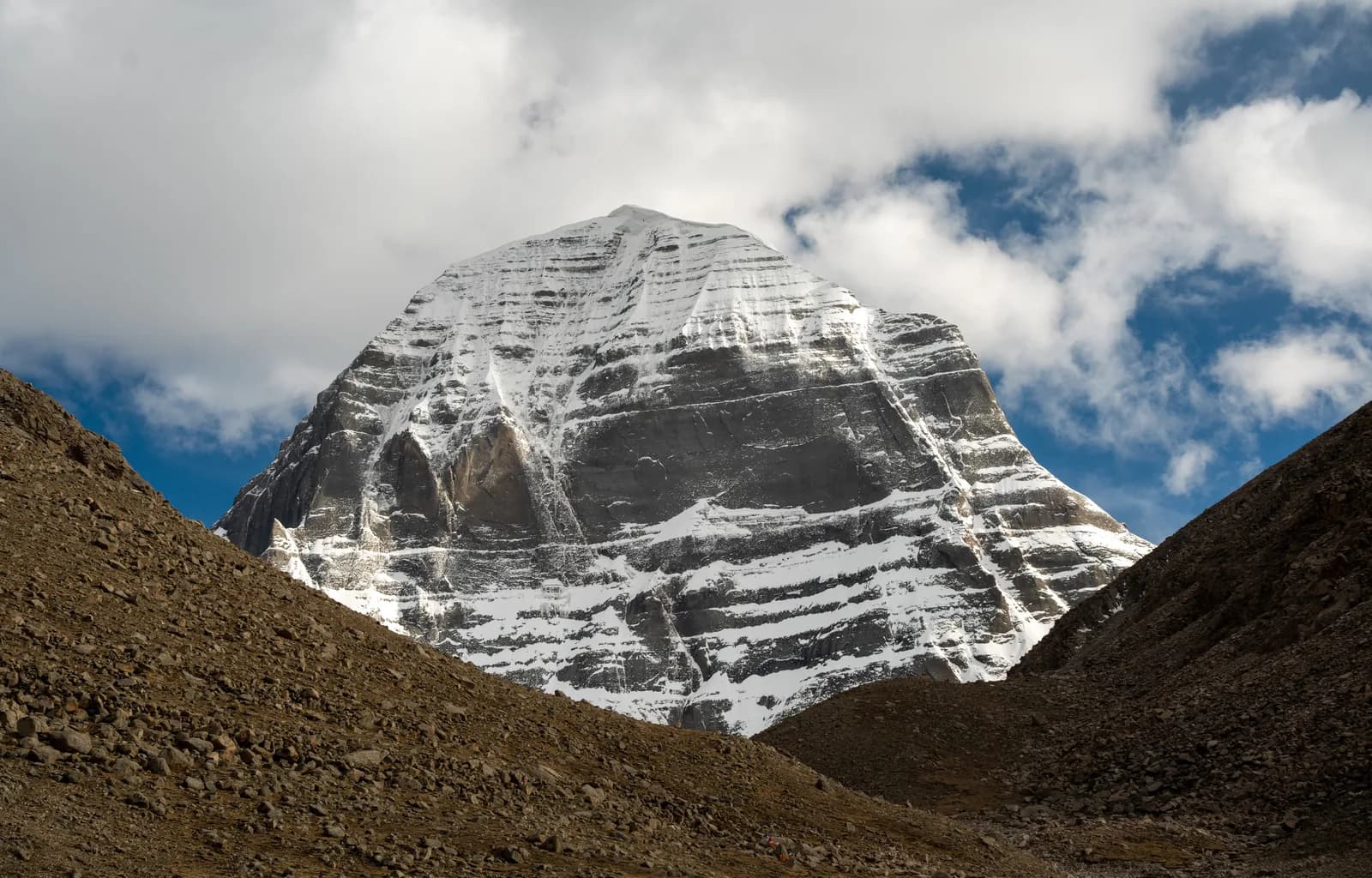 North face of Mount Kailash with clouds