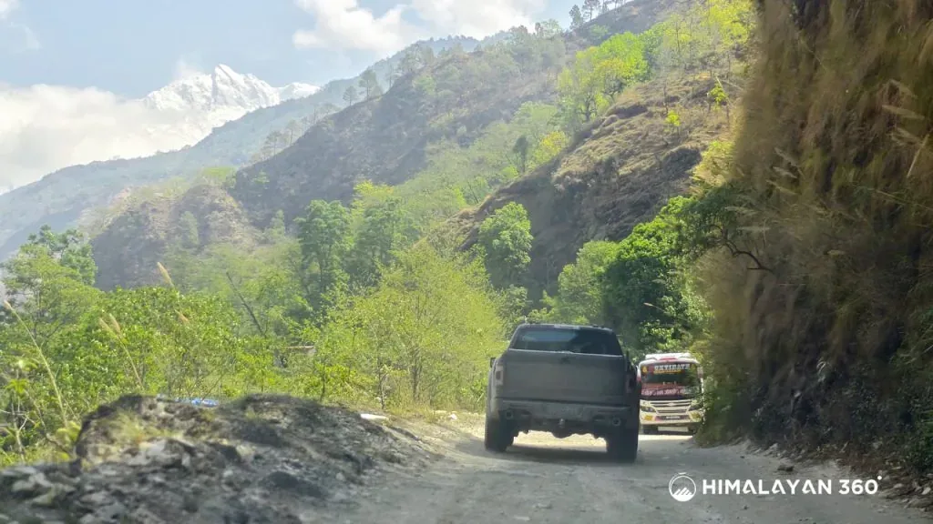 Vehicles on the Upper Mustang road above the Kali Gandaki