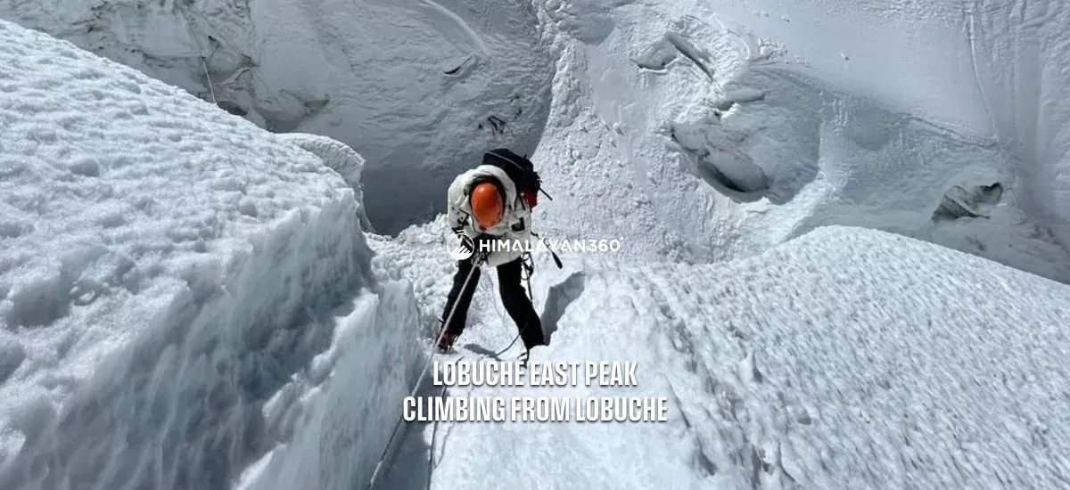 A person on Snowcapped Lobuche Peak