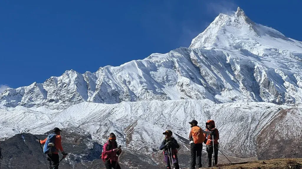 Aerial view of Manaslu mountain along with trekkers