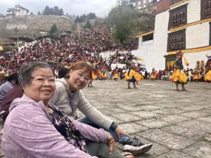 enjoying at paro tshechu festival